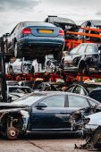 pile of scrap cars in scrap car yard
